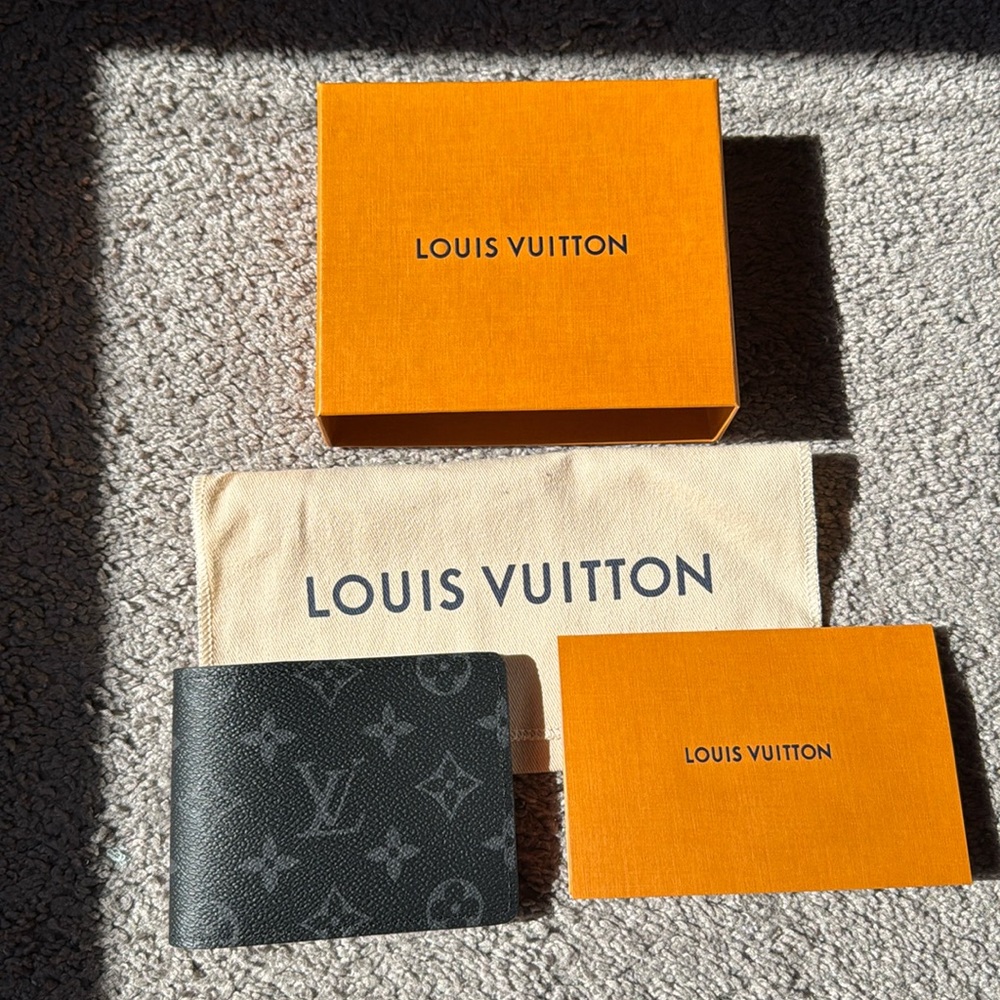 Louis Vuitton slender wallet.